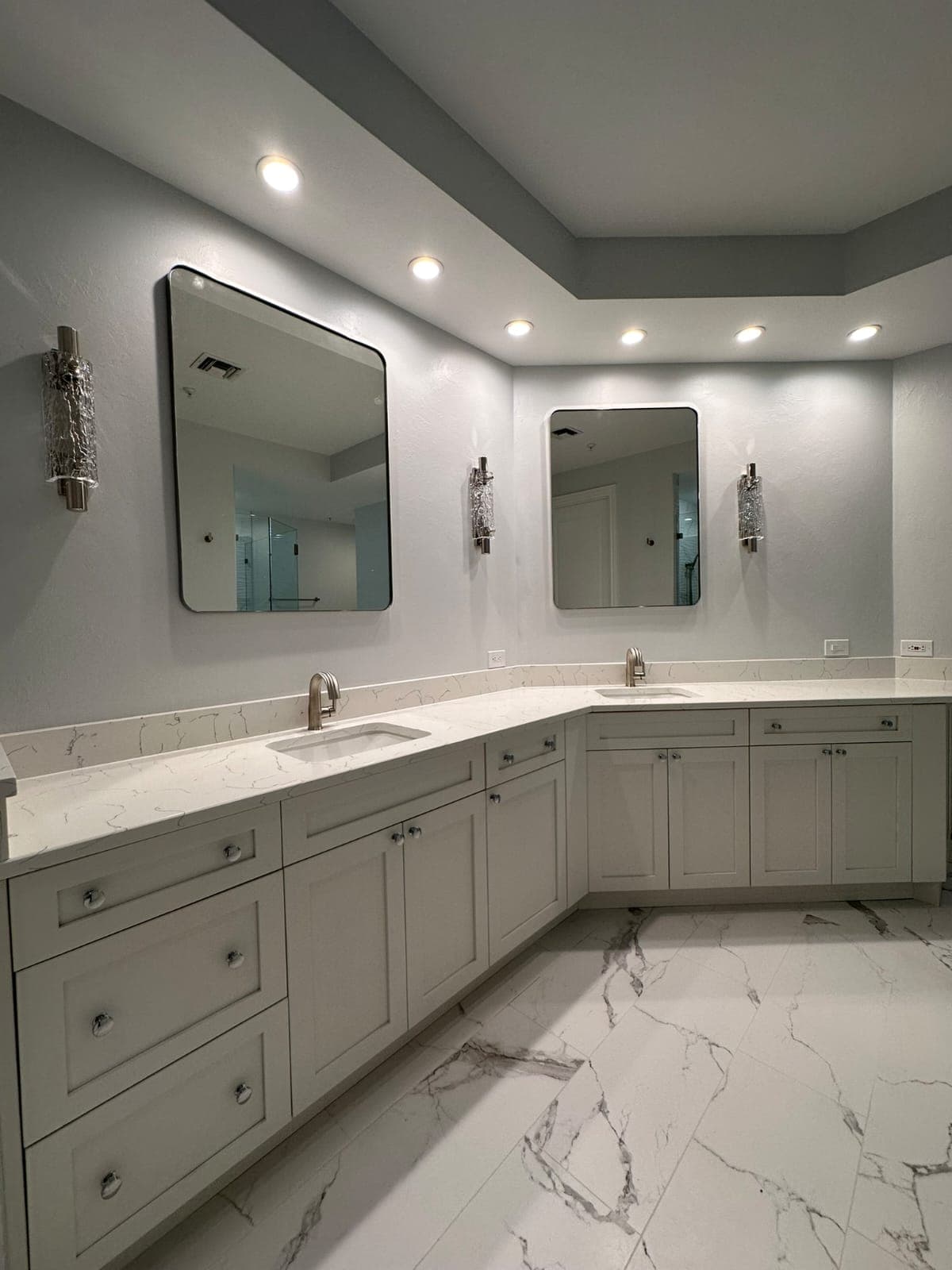 Double vanity bathroom with new sinks and faucets installed