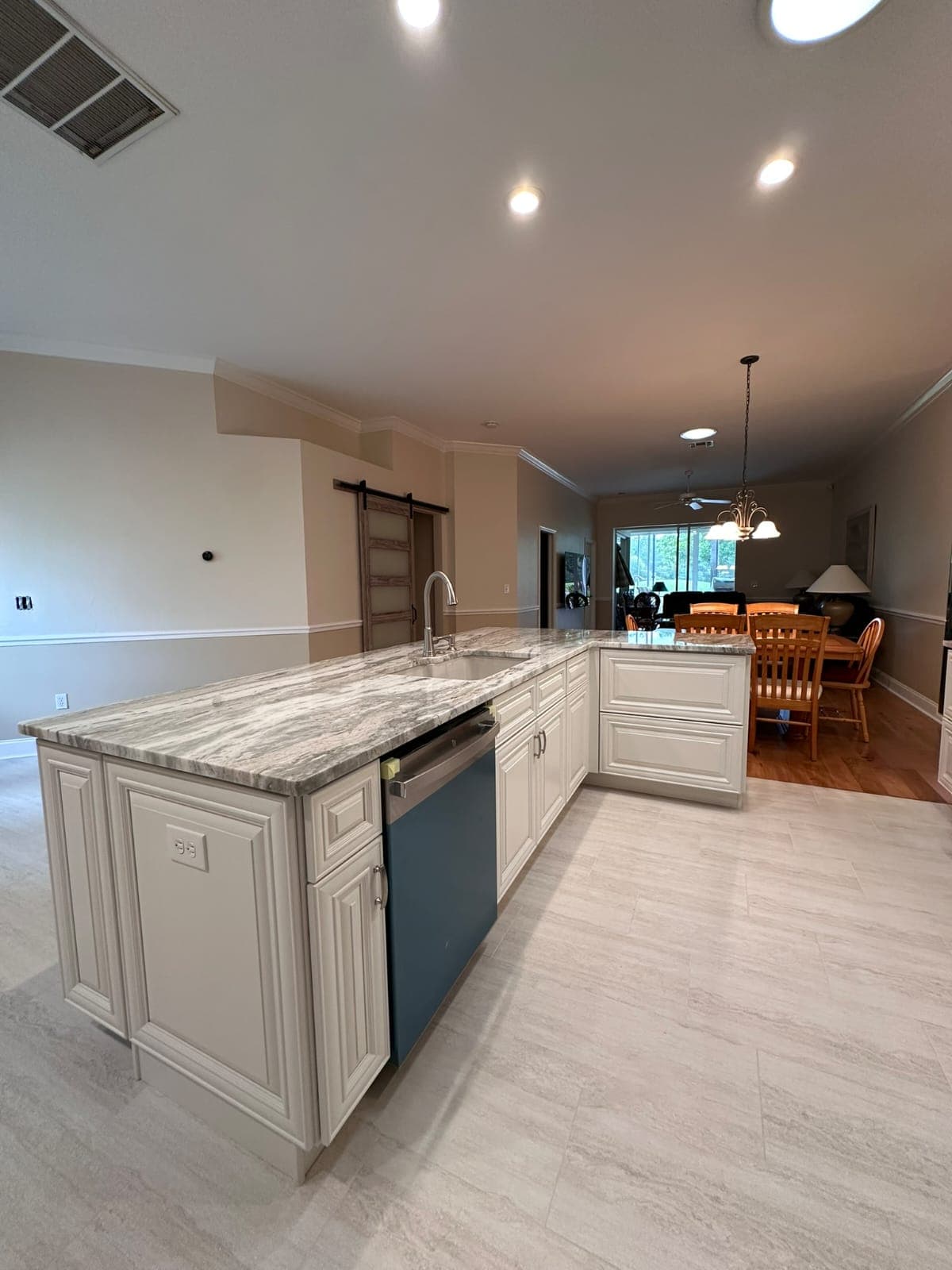 Kitchen island with new sink, faucet and dishwasher installed